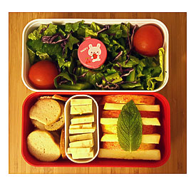 Happy Salad Bento With Cheese, Crackers, And Apple