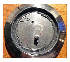 Picture Showing The J B Weld Steel Epoxy, Applied To Metal Lid Part