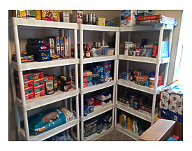 Three Shelves Filled With Food And Household Items